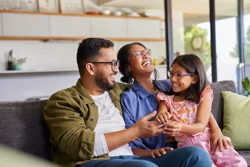 parents-playing-with-daighter-at-home.jpg