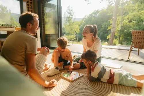 family-playing-games-on-rug.jpg